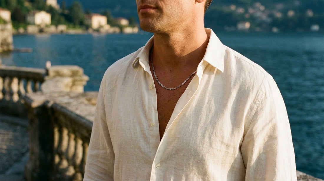 3mm steel figaro chain worn with an open linen shirt above Lake Como