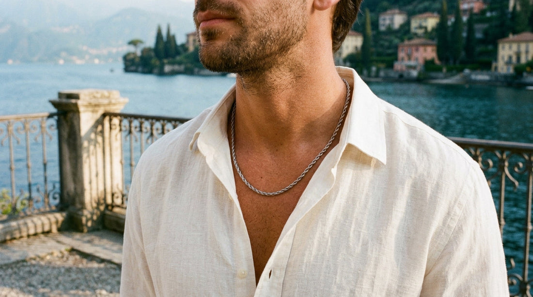 3mm polished steel rope chain worn with an open ivory linen shirt on a terrace above Lake Como