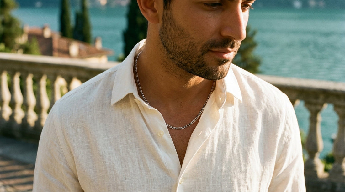3mm figaro chain worn with an open ivory linen shirt