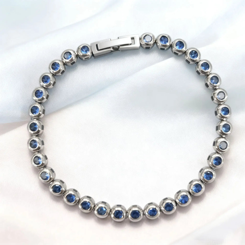 Silver with Light Blue Zircon