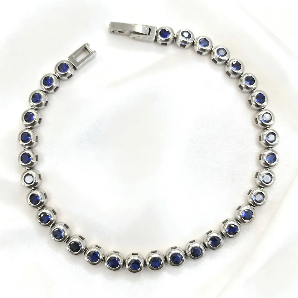 Silver with Dark Blue Zircon