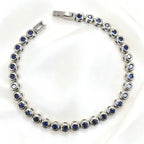 Silver with Dark Blue Zircon