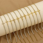 18K Gold PVD Cross Charm Tennis Bracelet