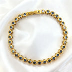 Gold with Light Blue Zircon