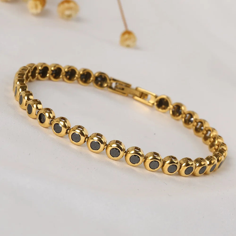 Gold with Black Zircon