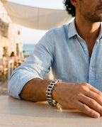Marco Maveri Bicycle Chain Link Bracelet worn with a linen shirt, close-up, Silver