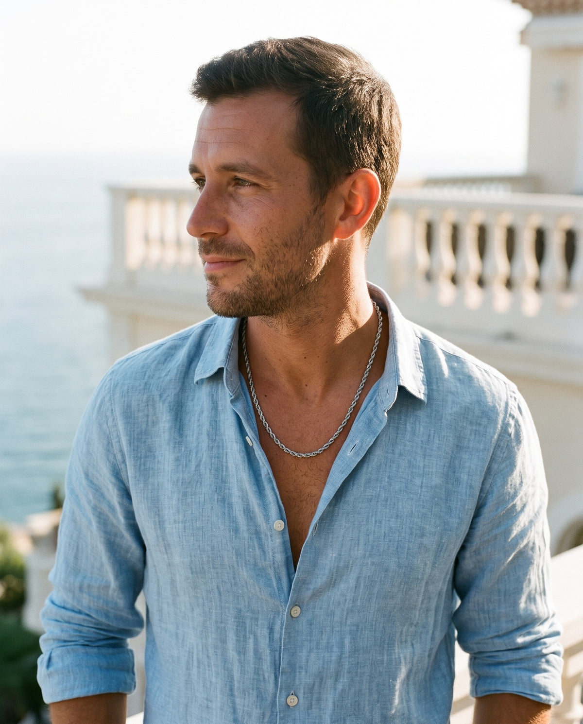 Man wearing the Marco Maveri Braided Titanium Steel Chain by the sea, Silver