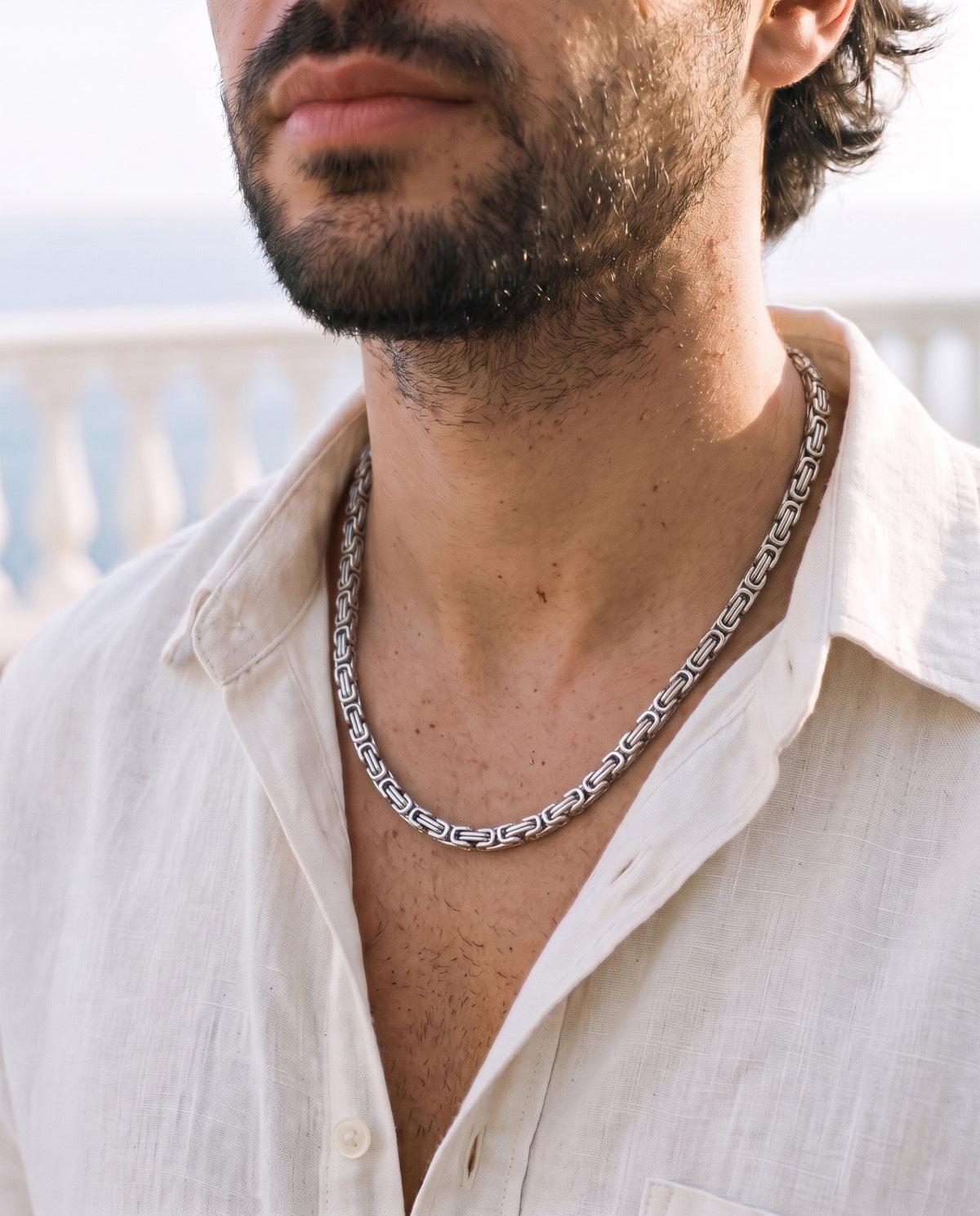 Marco Maveri Byzantine Chain in Stainless Steel worn with a linen shirt, close-up, Silver