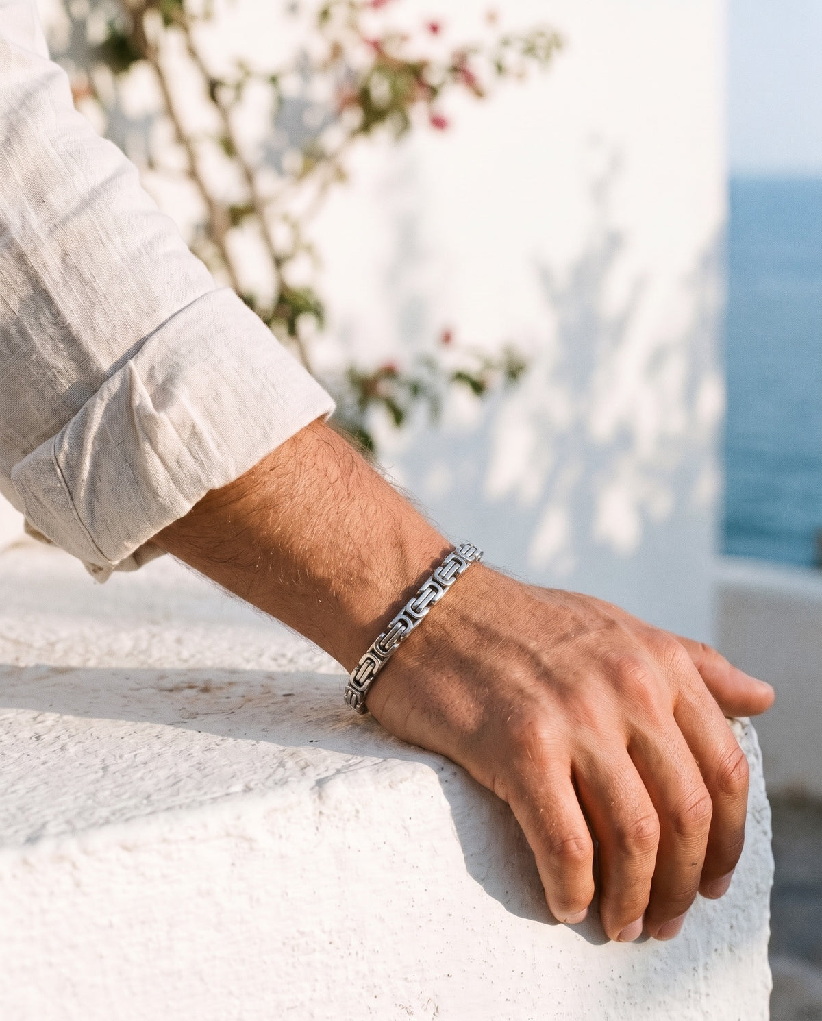 Marco Maveri Byzantine Link Bracelet worn with a linen shirt, close-up, Silver