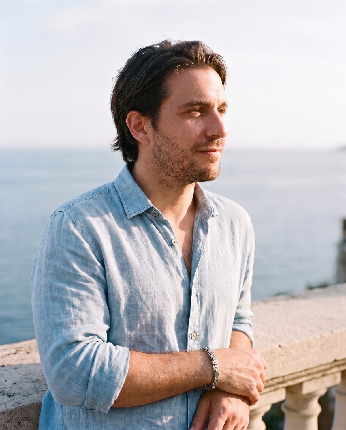 Man wearing the Marco Maveri Byzantine Link Bracelet by the sea, Silver
