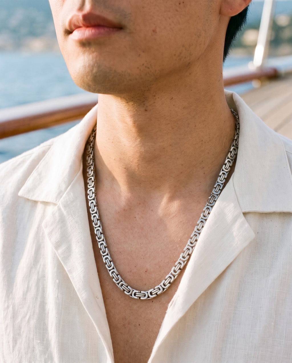 Marco Maveri Byzantine Link Chain Necklace worn with a linen shirt, close-up, Silver