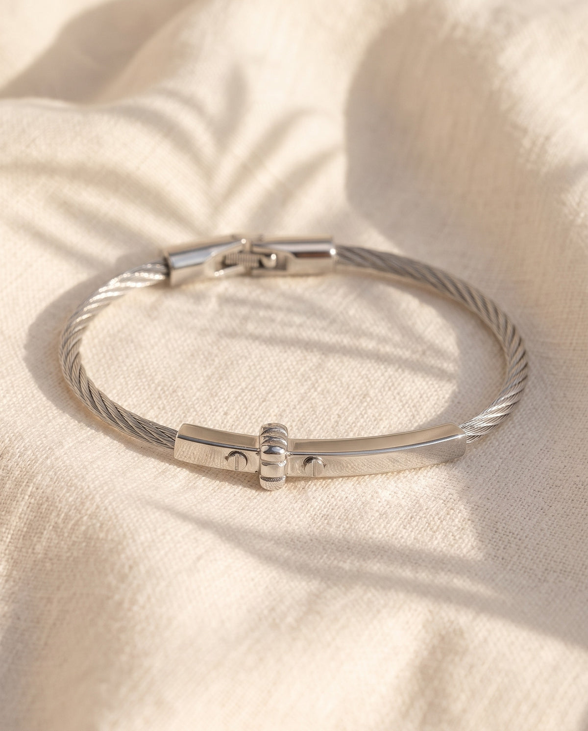 Marco Maveri Cable Bracelet with Bar Detail laid on cream linen, Silver
