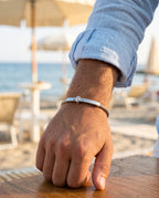 Marco Maveri Cable Bracelet with Bar Detail worn with a linen shirt, close-up, Silver