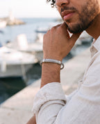 Marco Maveri Cable Cuff Bracelet worn with a linen shirt, close-up, Silver