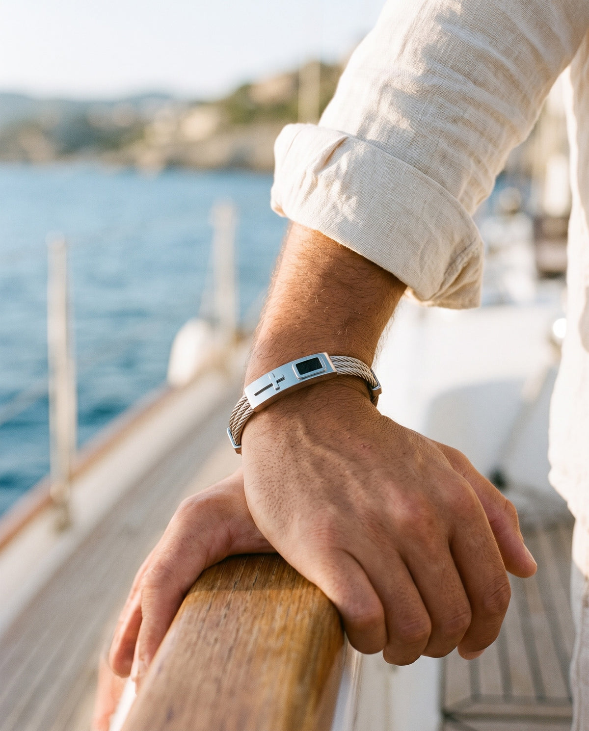 Marco Maveri Cross Inlay Titanium Steel Bracelet worn with a linen shirt, close-up, Silver