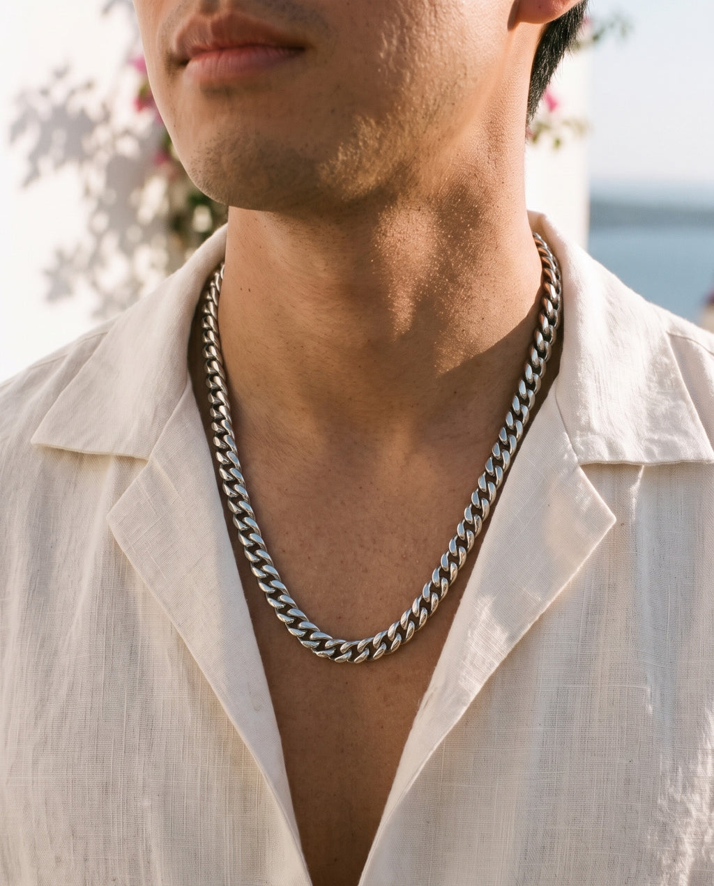 Marco Maveri Silver Cuban Link Chain worn with a linen shirt, close-up, Silver
