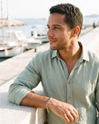 Man wearing the Marco Maveri Cuban Link Chain Bracelet by the sea, Silver