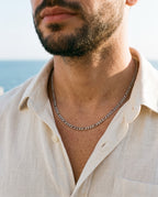 Marco Maveri Figaro Chain in Stainless Steel worn with a linen shirt, close-up, Silver