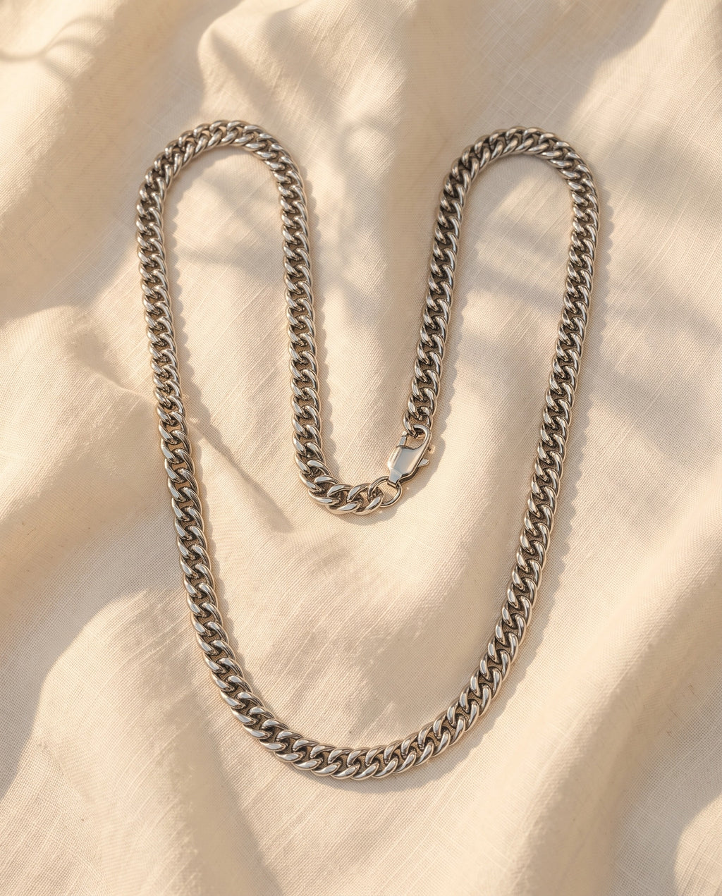 Marco Maveri Franco Link Chain Necklace laid on cream linen, Silver