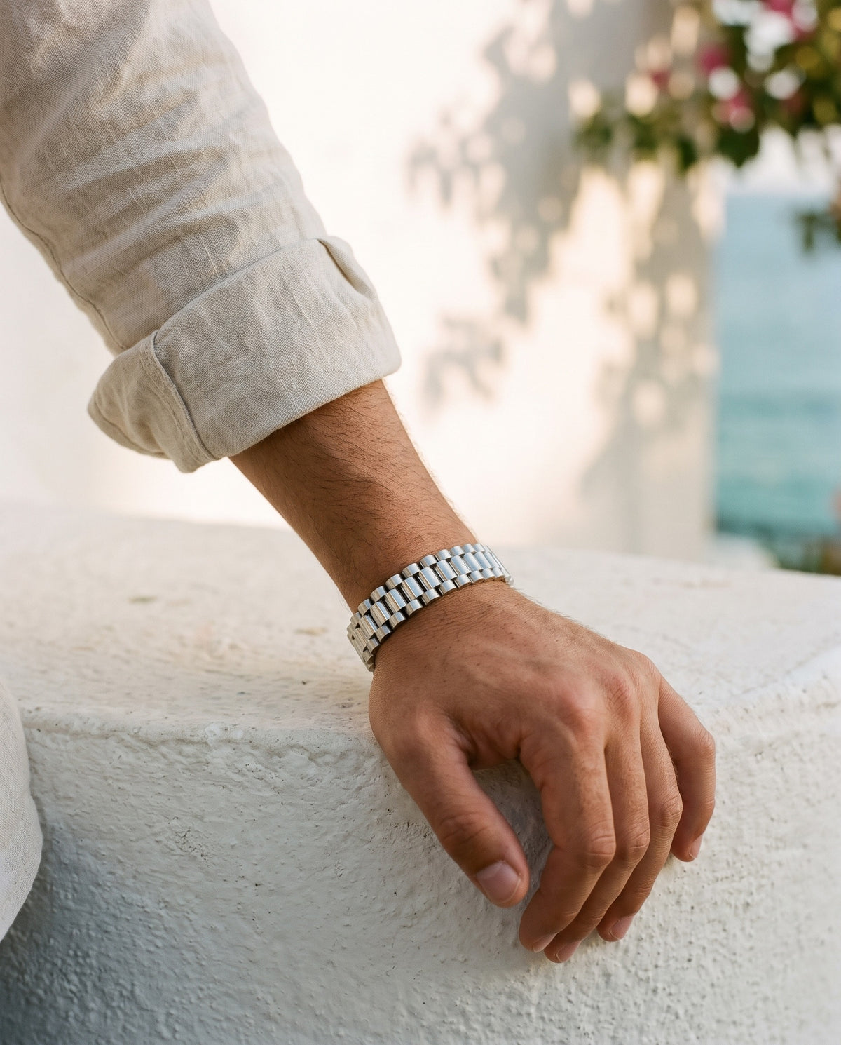 Marco Maveri Geometric Link Bracelet in Titanium Steel worn with a linen shirt, close-up, Silver