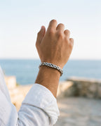 Marco Maveri Geometric Link Byzantine Bracelet worn with a linen shirt, close-up, Silver