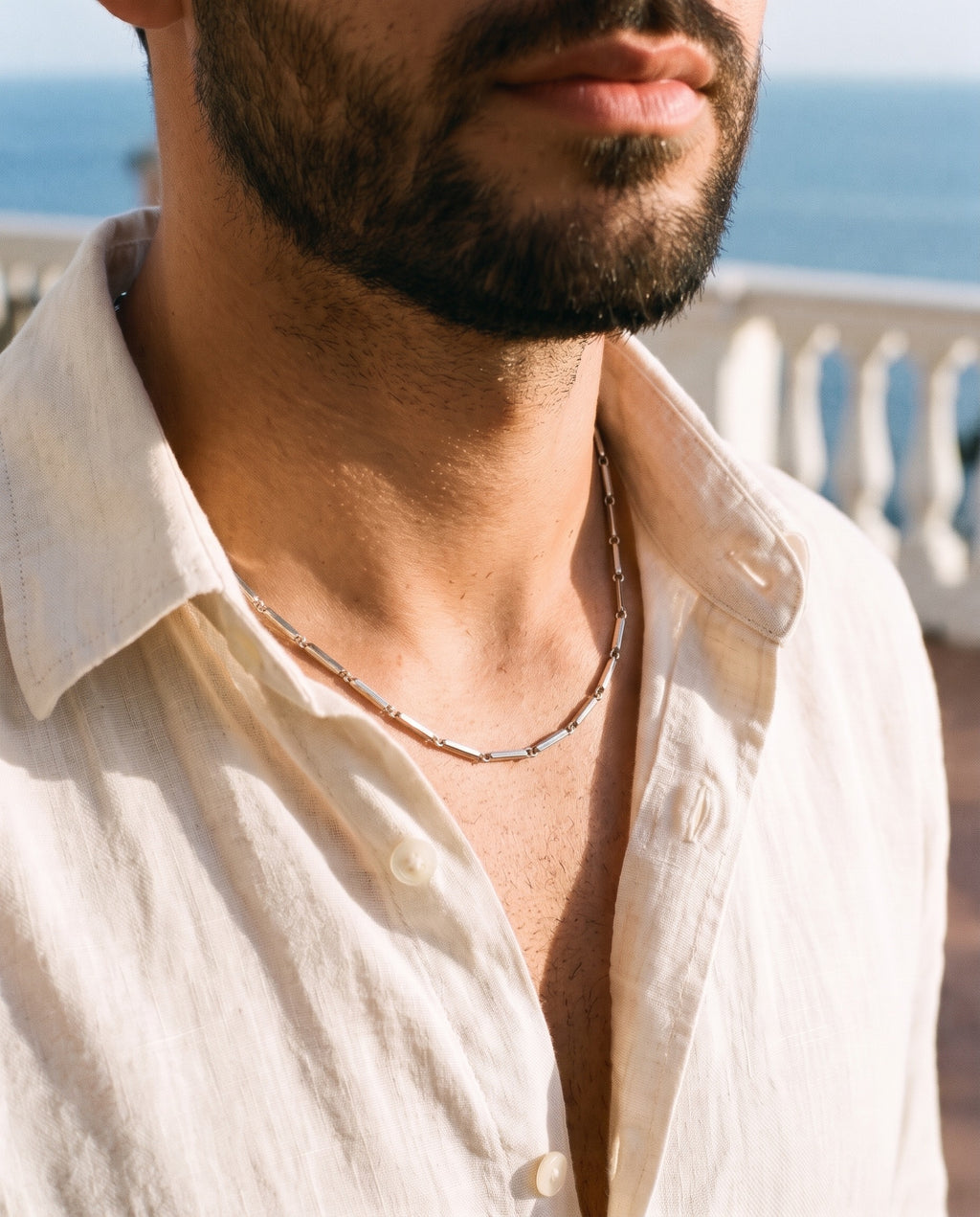 Marco Maveri Geometric Link Chain in Stainless Steel worn with a linen shirt, close-up, Silver