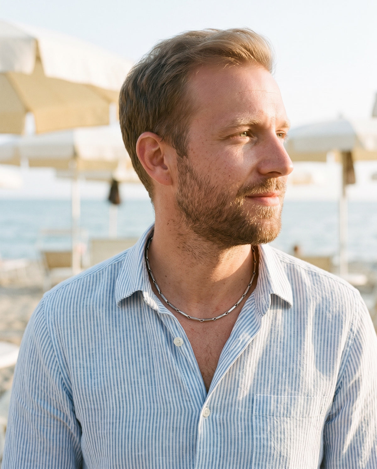Man wearing the Marco Maveri Geometric Link Chain in Stainless Steel by the sea, Silver