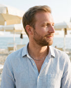 Man wearing the Marco Maveri Geometric Link Chain in Stainless Steel by the sea, Silver