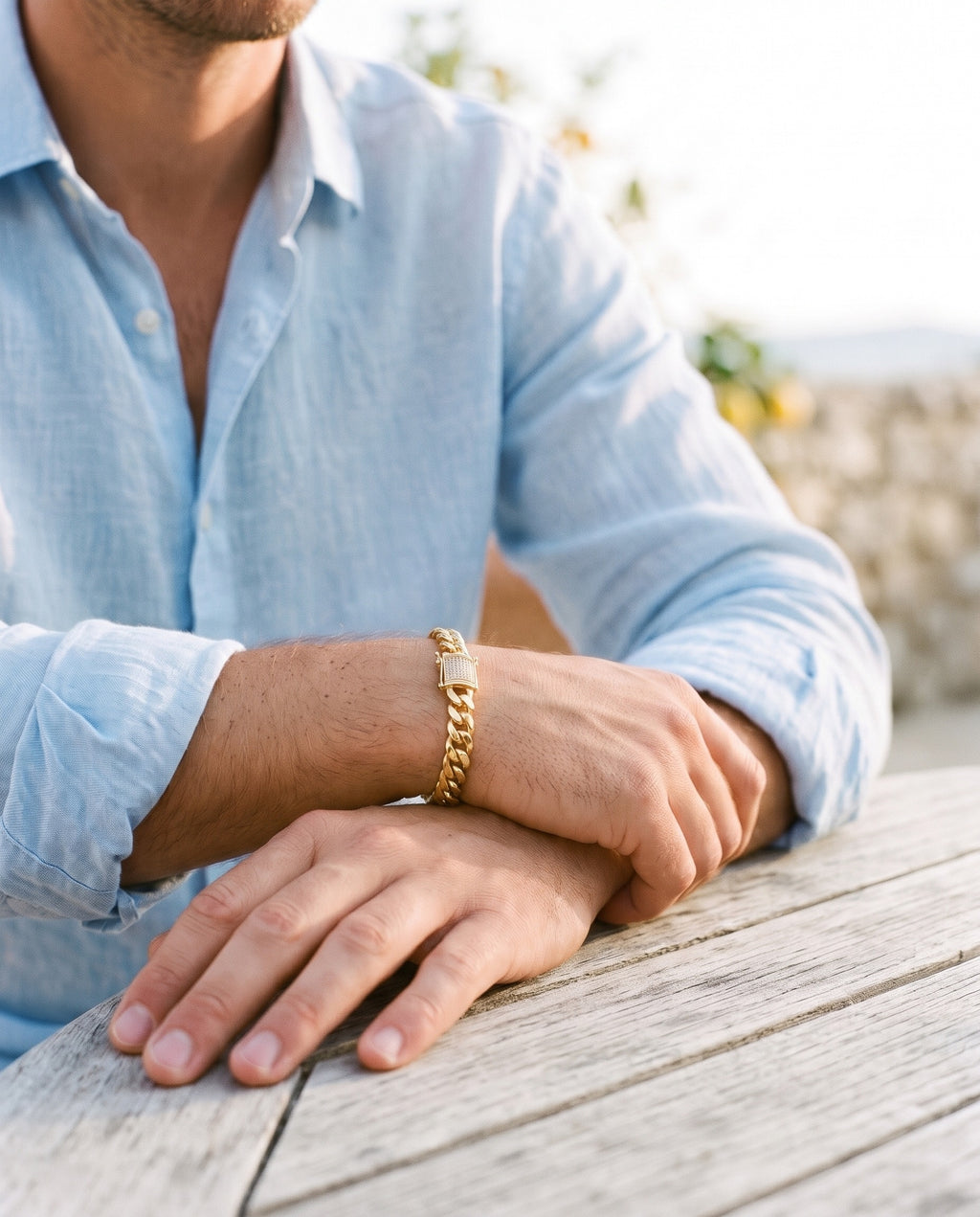 Marco Maveri Gold-Tone Cuban Link Bracelet worn with a linen shirt, close-up, Gold