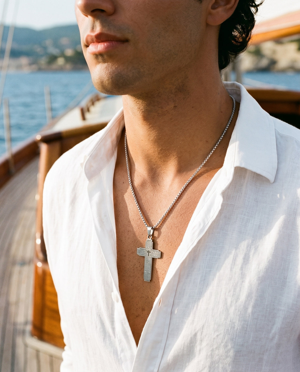 Marco Maveri Lord's Prayer Cross Pendant Necklace worn with a linen shirt, close-up, Silver