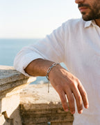 Marco Maveri Paperclip Link Bracelet worn with a linen shirt, close-up, Silver