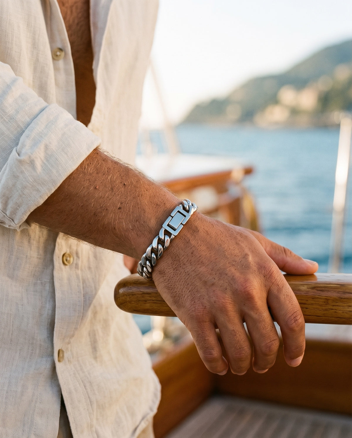 Marco Maveri Polished Cuban Link Bracelet worn with a linen shirt, close-up, Silver