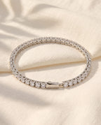 Marco Maveri Tennis Bracelet with Cubic Zirconia laid on cream linen, Silver