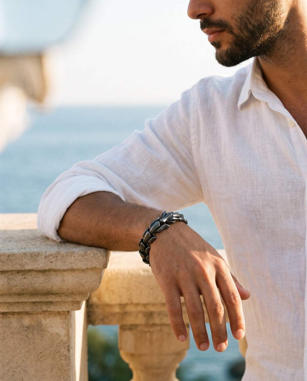 Marco Maveri Titanium Steel Keel Link Bracelet worn with a linen shirt, close-up, Black
