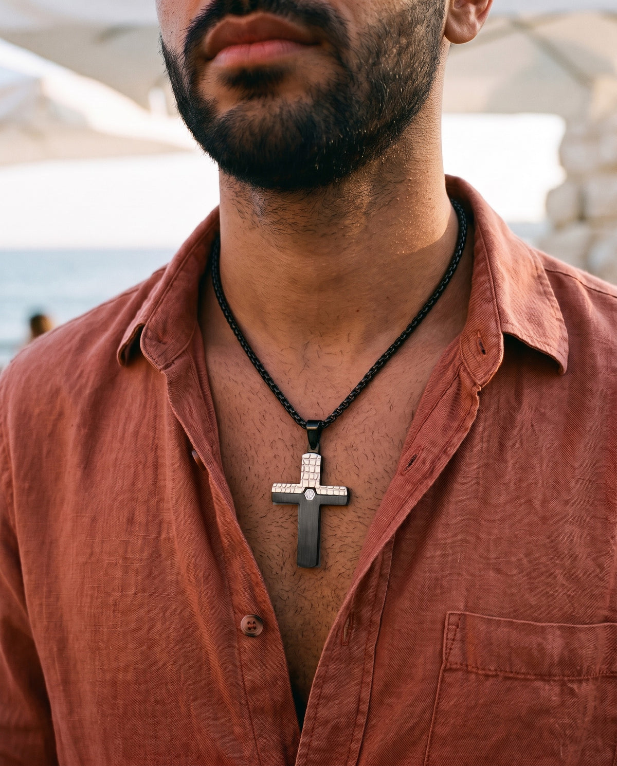 Marco Maveri Two-Tone Inlaid Cross Pendant Necklace worn with a linen shirt, close-up, Black / Silver