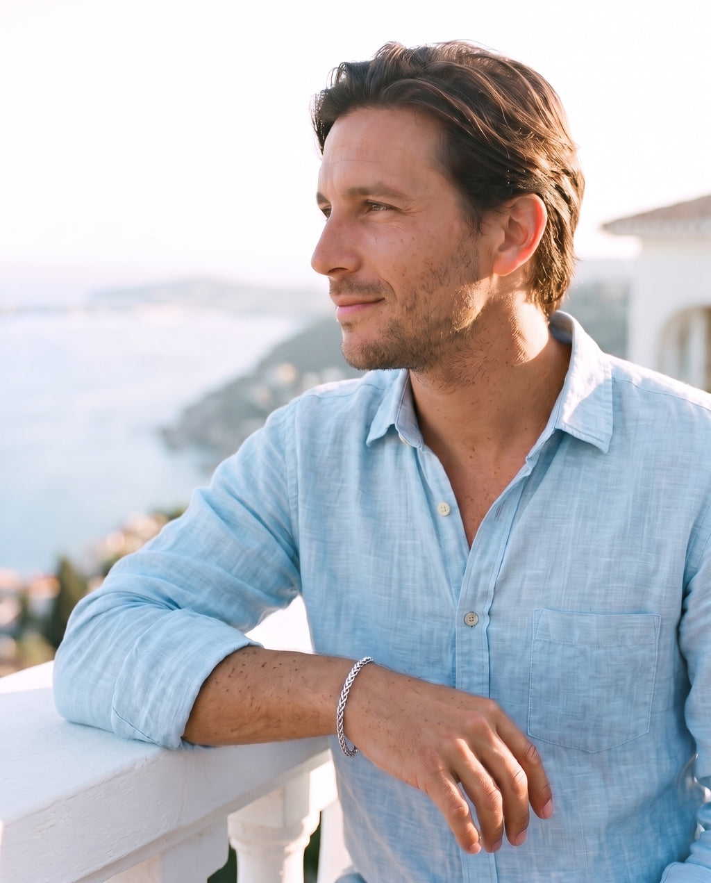 Man wearing the Marco Maveri Wheat Link Chain Bracelet by the sea, Silver